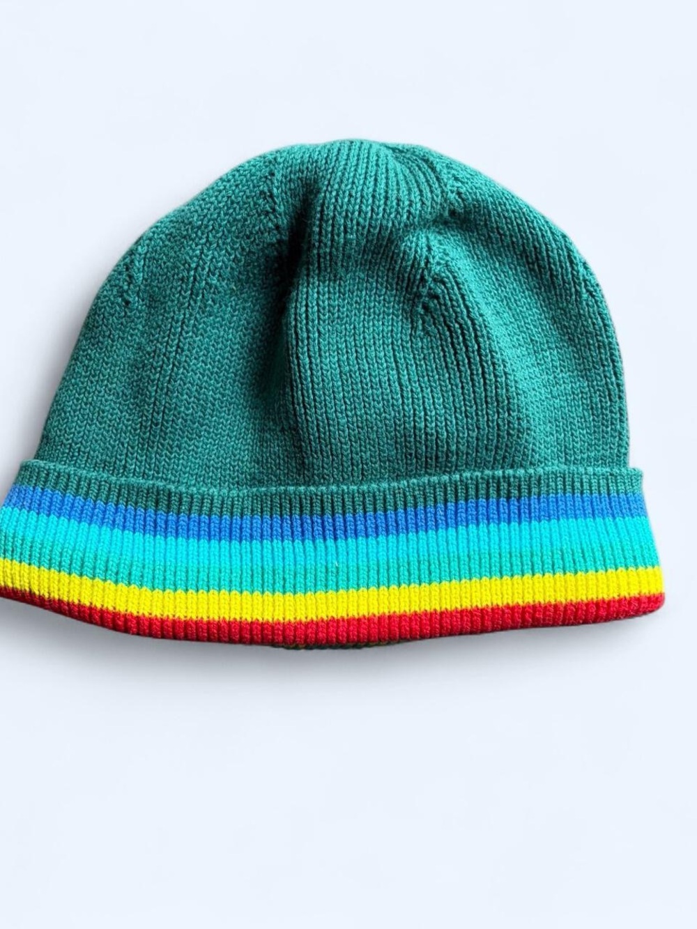 Primary baby Teal Knit Hat with Rainbow Stripe Cuff